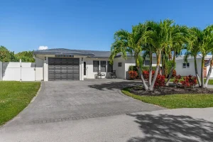 Residential concreting services Melbourne featuring modern driveway and outdoor concrete design